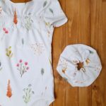 Body in cotone con riccetto sul davanti